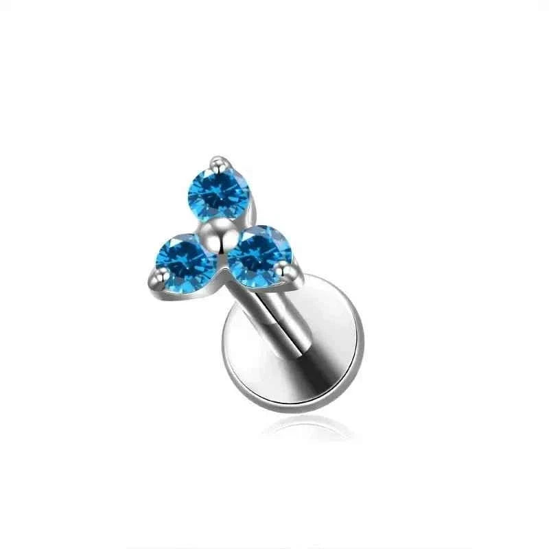Blue three-stone CZ top on a silver-tone flat back labret stud.