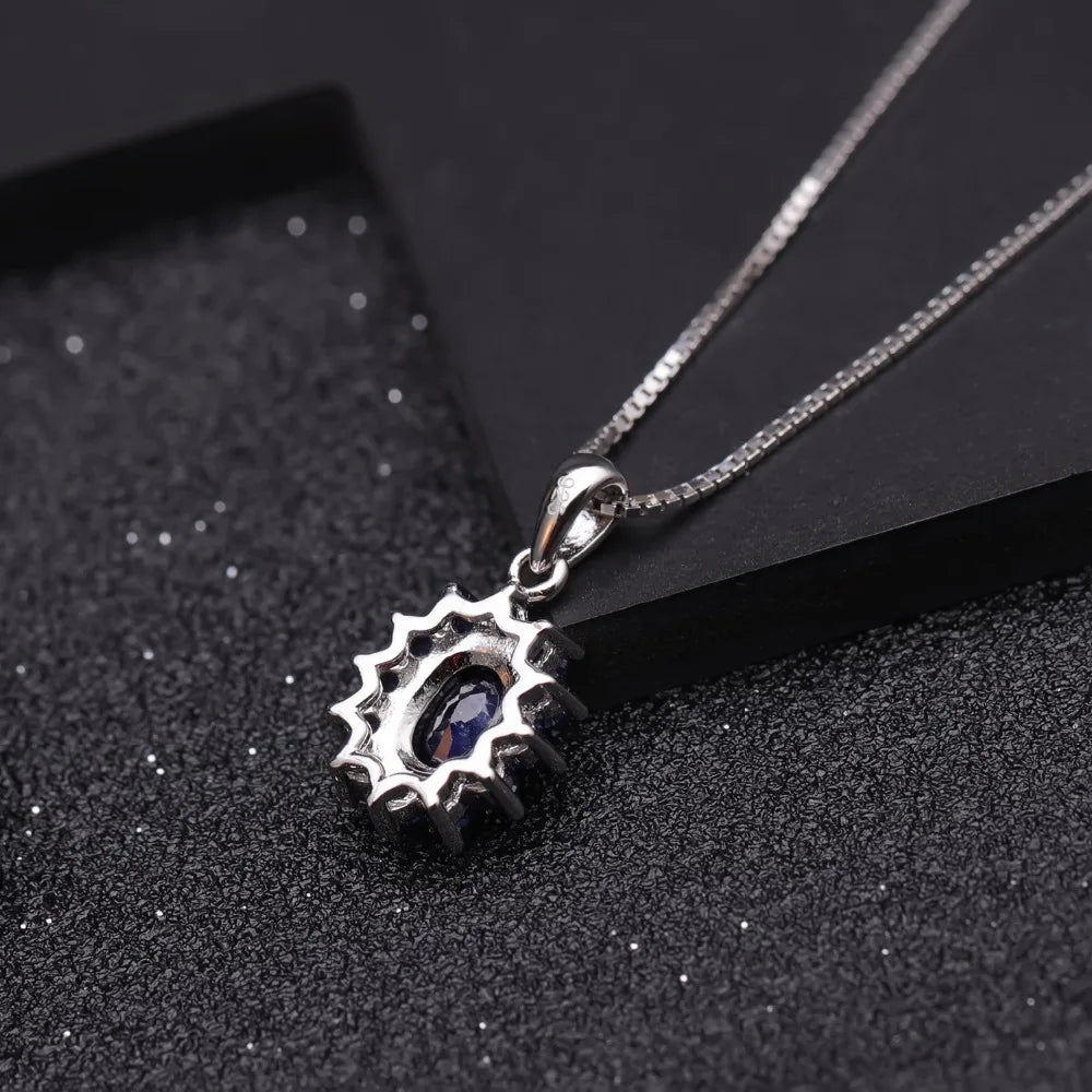 September birthstone blue sapphire necklace with vintage halo pendant