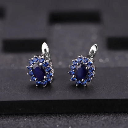 September birthstone blue sapphire stud earrings in sterling silver vintage halo style