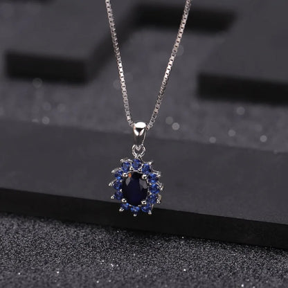 September birthstone blue sapphire necklace with vintage halo pendant