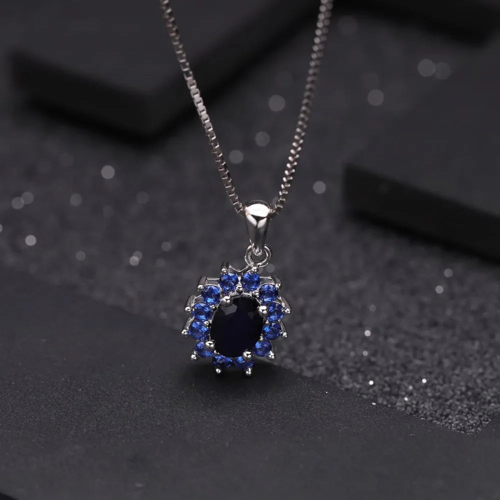September birthstone blue sapphire necklace with vintage halo pendant