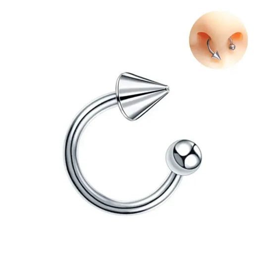 Silver-tone titanium horseshoe septum ring with one spike and one ball end